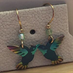 Pretty hummingbird earrings in like new condition.